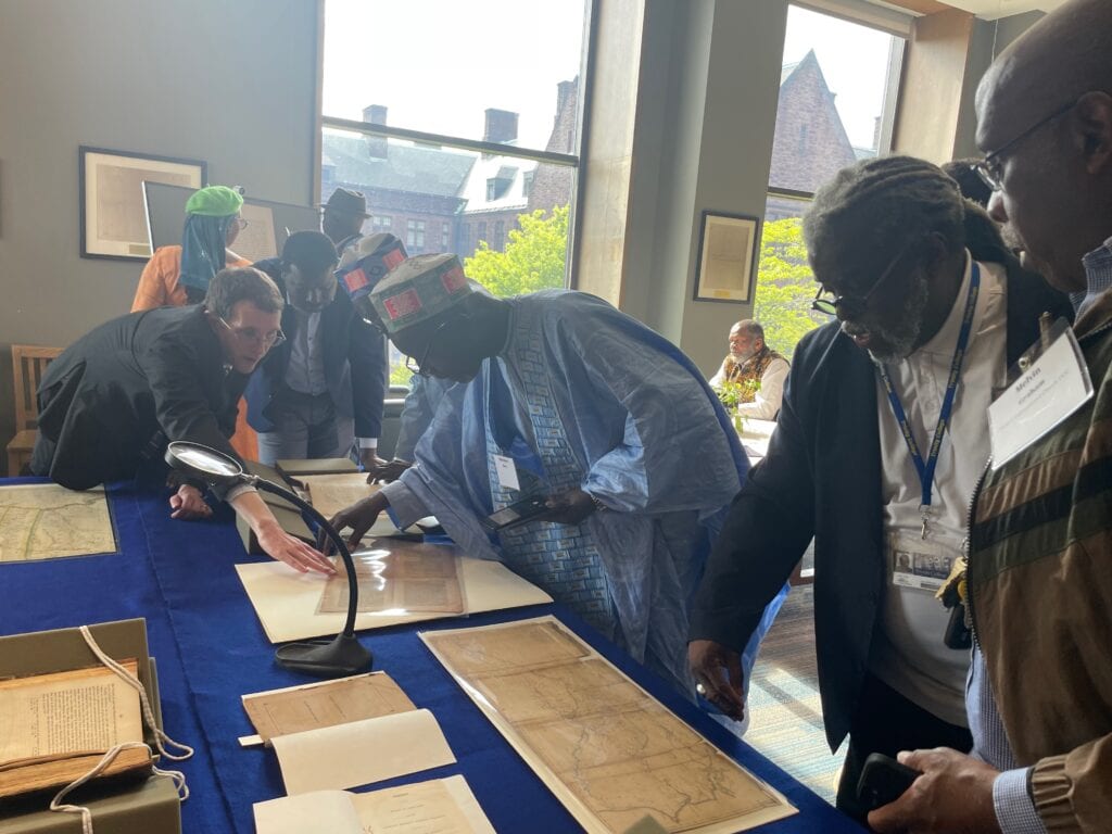 Timbo elders with Trinity archivists