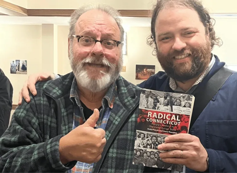 Steve Thornton and Jordan Camp holding Radical Connecticut